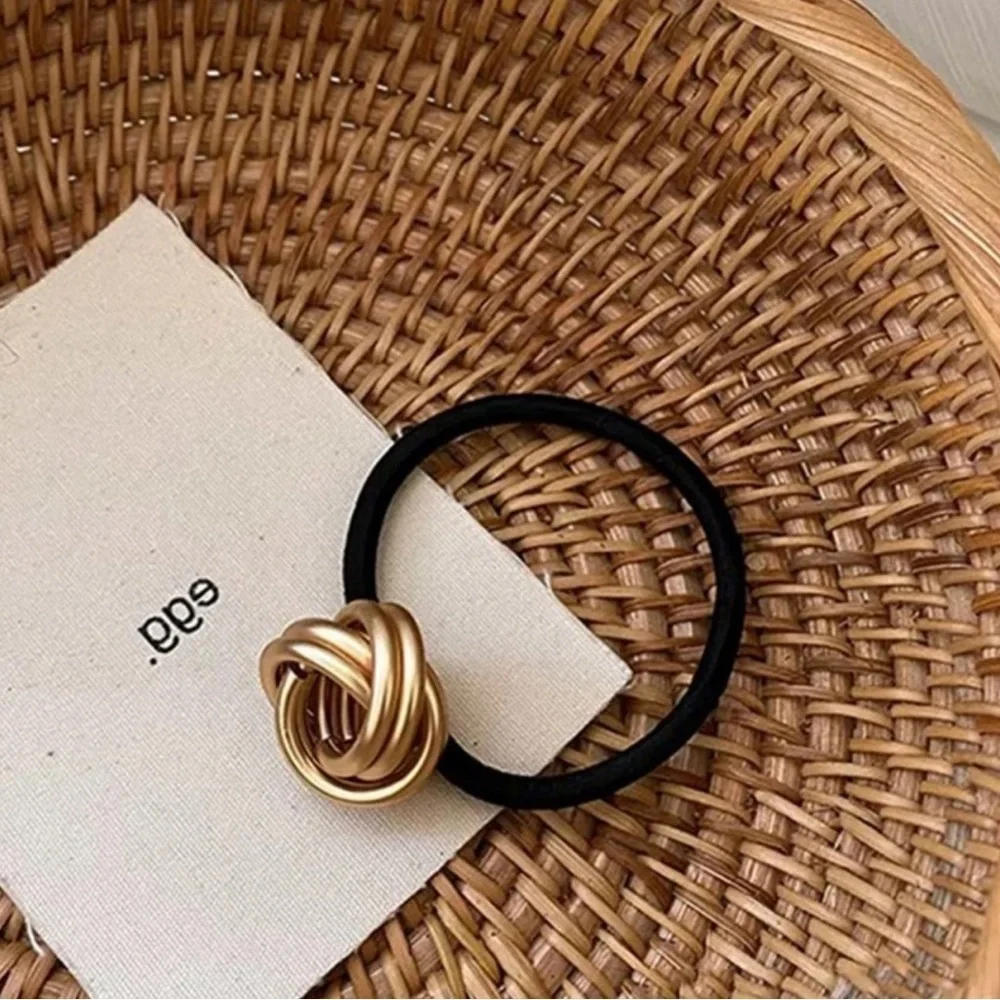 Gold hair tie